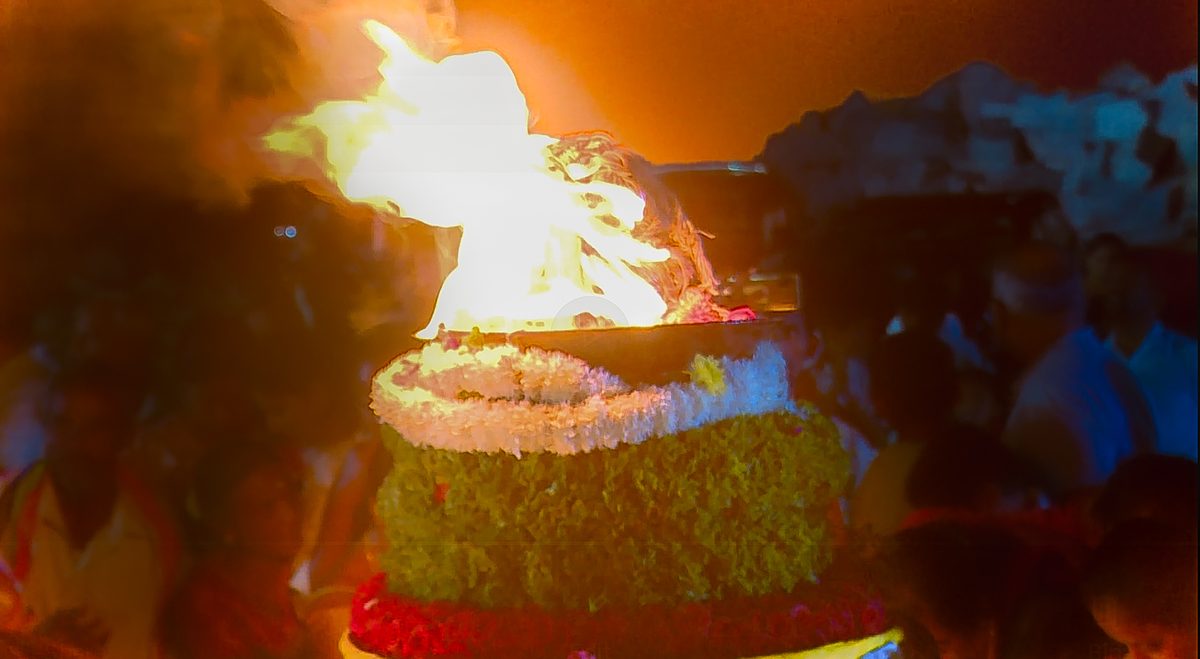 Lamps lit at Kailasagiri Cave Temple during a festival night