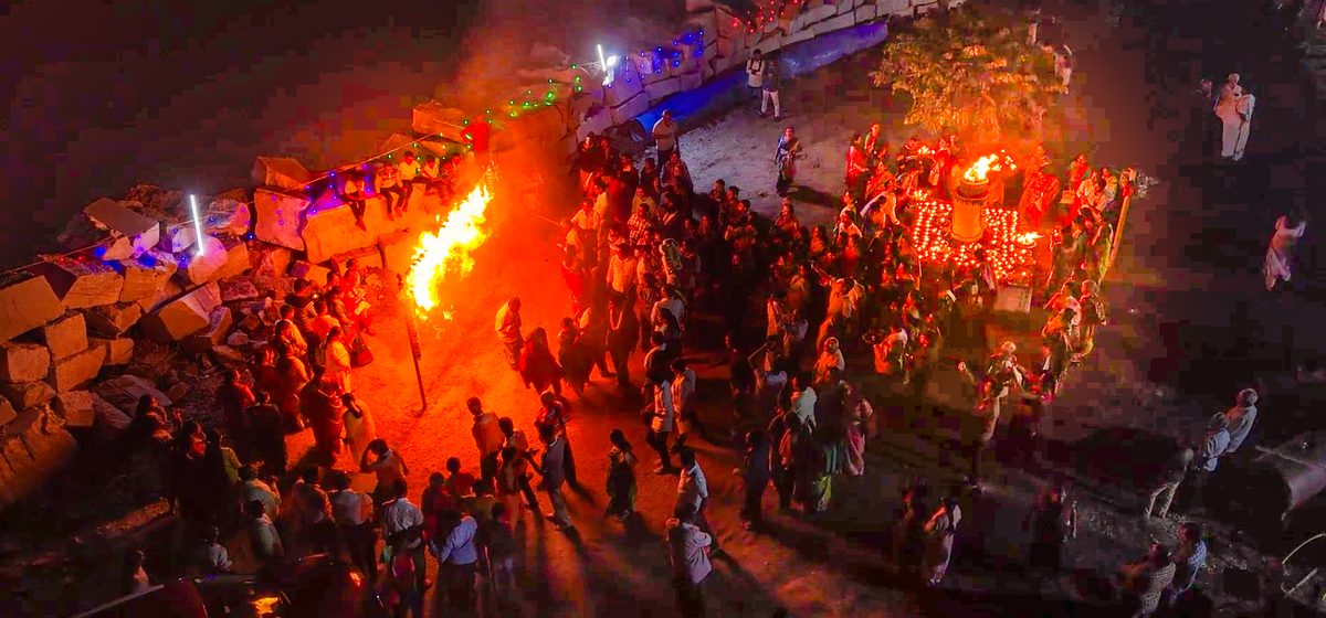 Lamps lit at Kailasagiri Cave Temple during a major festival night